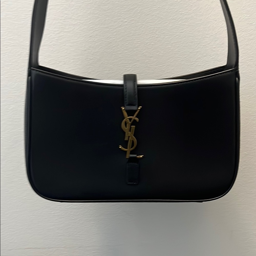 Yves Saint Laurent Black Shoulder Bag with Gold Logo and Curved Shape